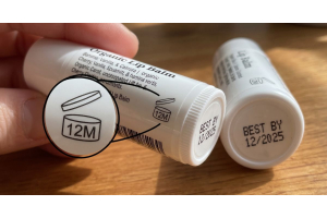 Lip balm with period-after-opening symbol, illustrating whether lip balm expires